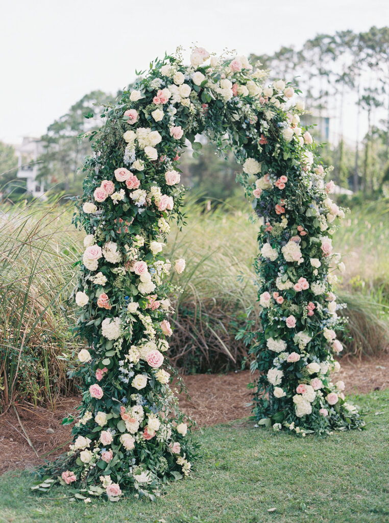 flower arch at garden wedding at carillon 