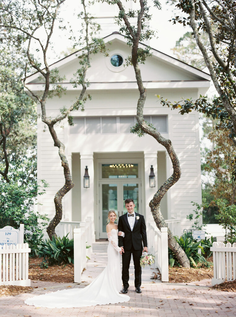 posing at the venue at garden wedding at carillon 