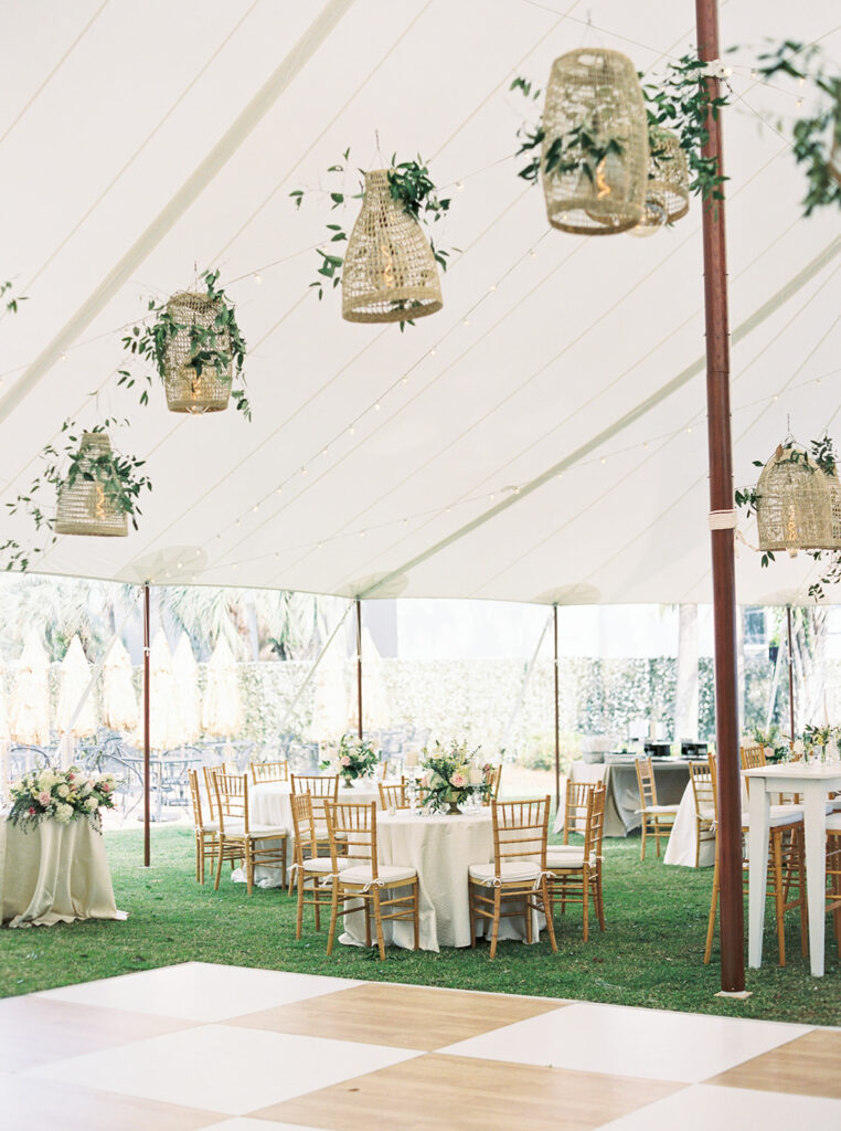 lanterns under the tent at garden wedding at carillon 