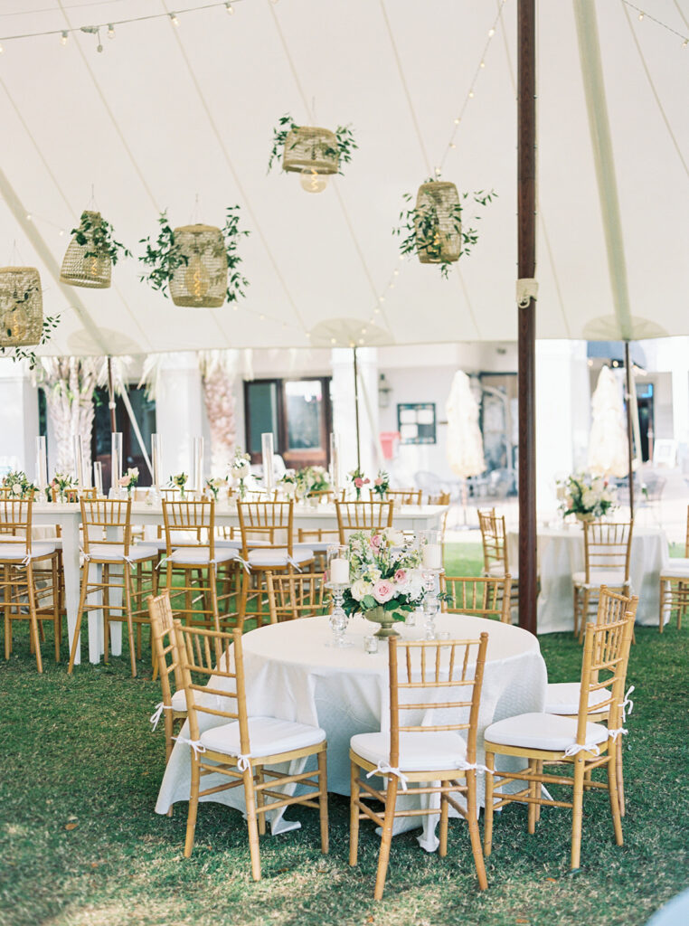 table setup under the tent at garden wedding at carillon 