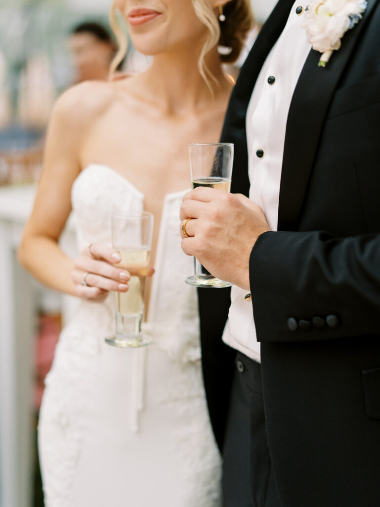 cheers to the bride and groom at garden wedding at carillon 