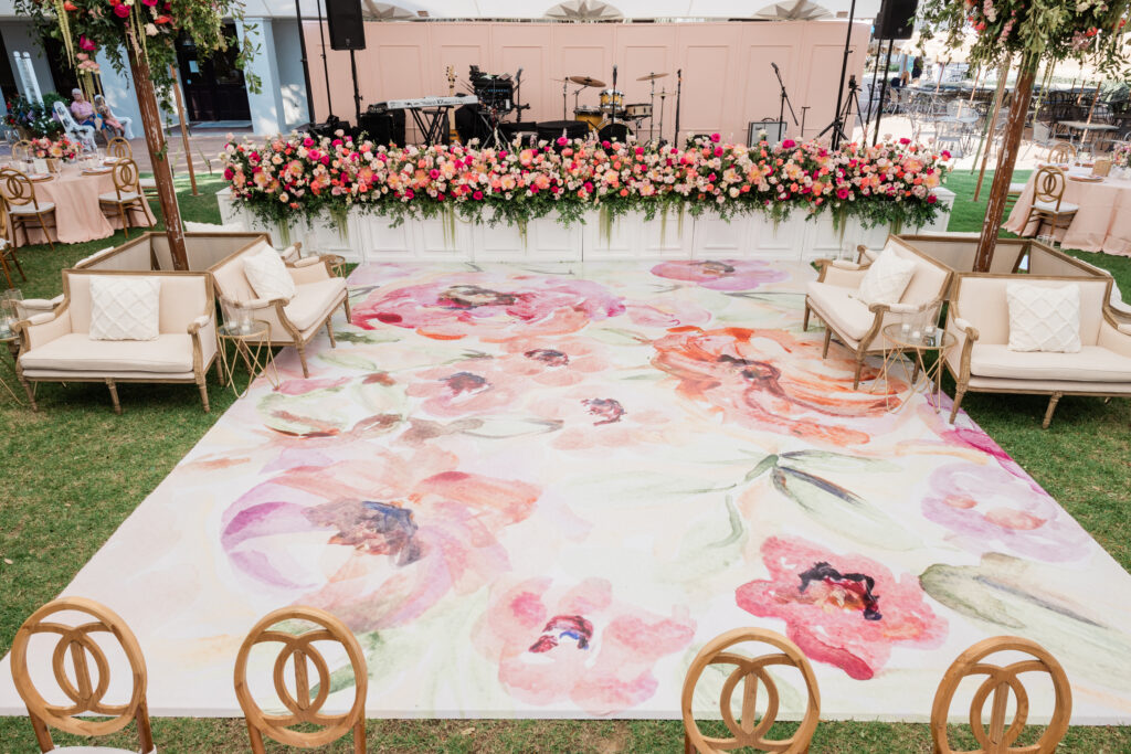 wedding design details of reception dance floor and floral accents at carillon wedding