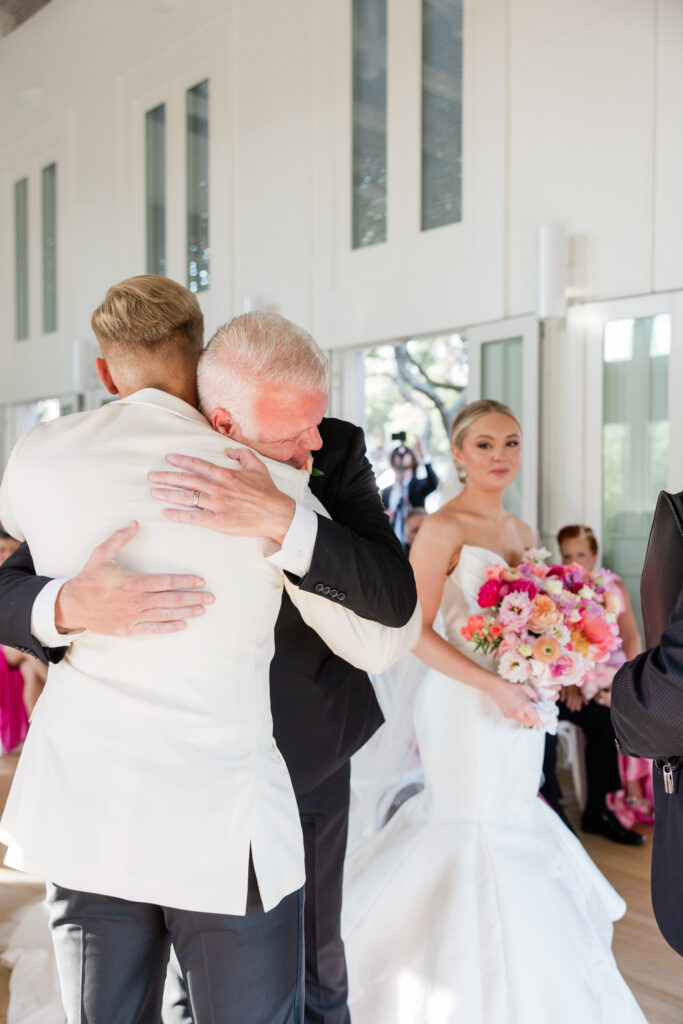 giving away the bride at the ceremony in carillon