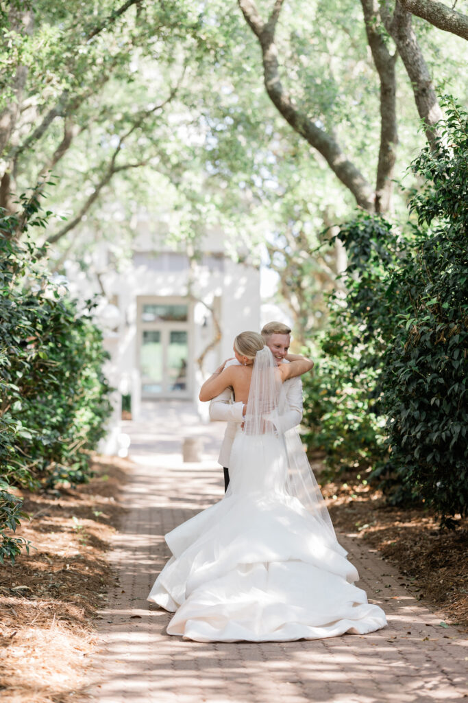 groom seeing his bride for the first time wedding at carillon