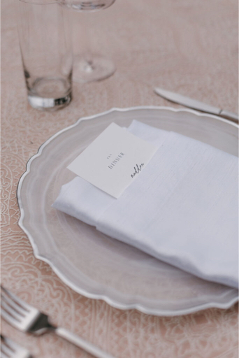 close up of table details at wedding near the seaside