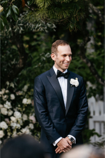 the groom waiting for his bride at the court seaside wedding