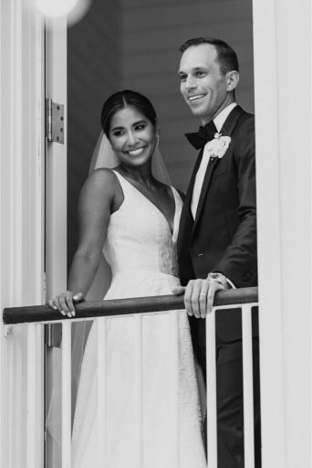 balcony photos of the bride and groom